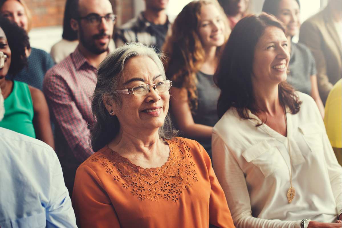 group of seniors in the audience smiling